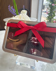 Tin box of 12
