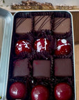 Tin box of 12
