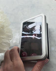 Tin box of 12